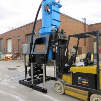 Powerlift Elevator Series being raised by forklift to upright position. 